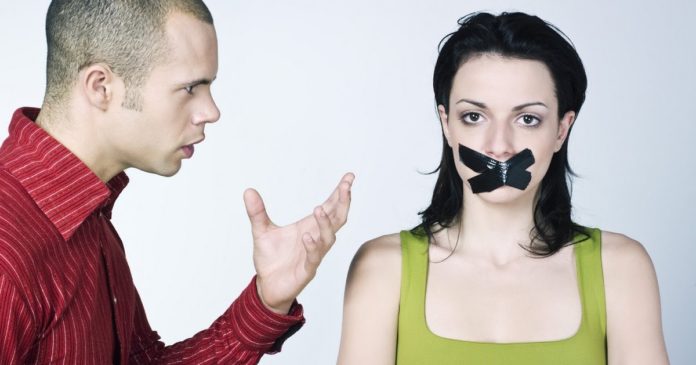 young couple conflict on isolated background
