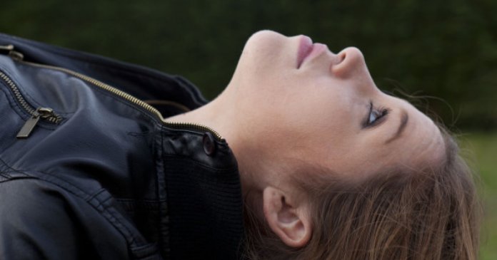 Woman lying down outside