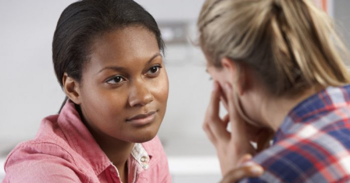 Teenage Girl Visits Doctor's Office Suffering With Depression