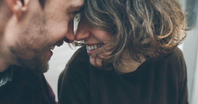 Vintage couple hugs and laughing .Coffee shop. instagram toned