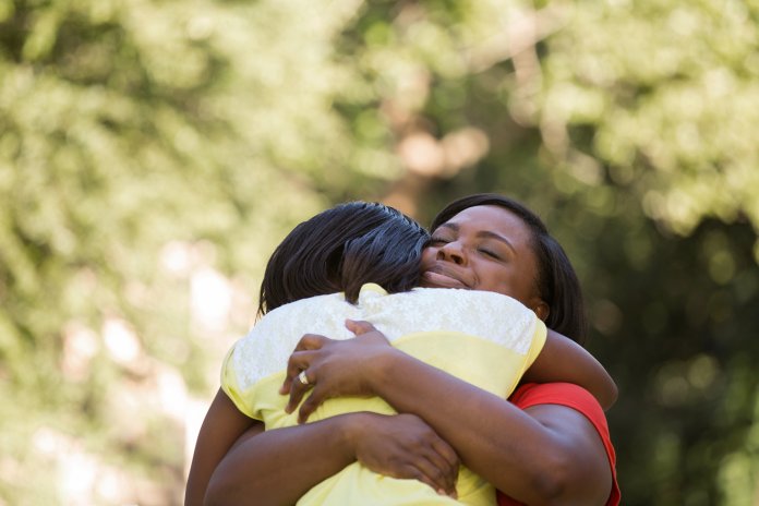 Mother and daughter talking