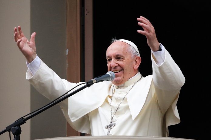Pope Francis addresses the crowd gathered outside the nunciature, in Lima