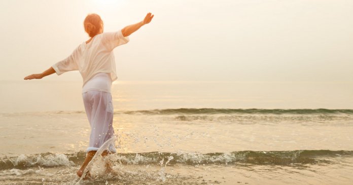 Happy woman on beach