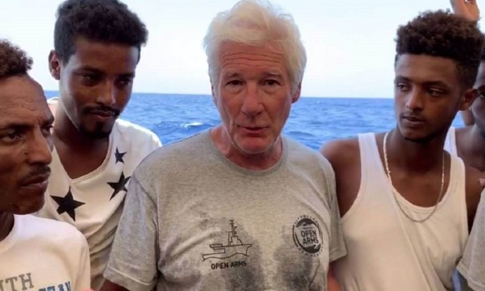 x84032067_An-image-grab-taken-from-a-video-released-by-the-Spanish-NGO-Proactiva-Open-Arms-on-Aug.jpg.pagespeed.ic_.hIlwZm3L8T