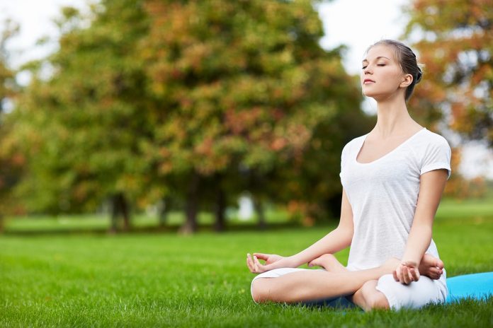Woman-yoga-lotus