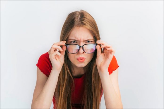 curious-woman-with-glasses-staring_23-2148221739