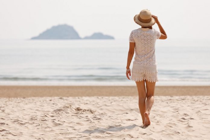 woman-walking-beach